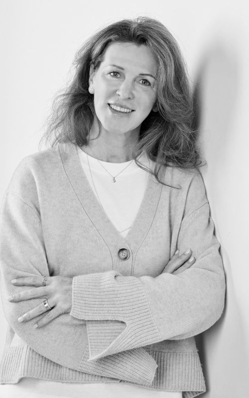 Portrait von Katrin Engers. Lernen Sie das engagierte Team hinter DRUECK kennen, das für höchste Qualität und exzellenten Kundenservice steht