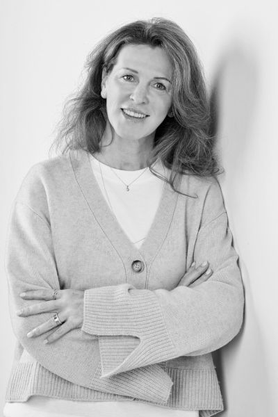 Portrait von Katrin Engers. Lernen Sie das engagierte Team hinter DRUECK kennen, das für höchste Qualität und exzellenten Kundenservice steht